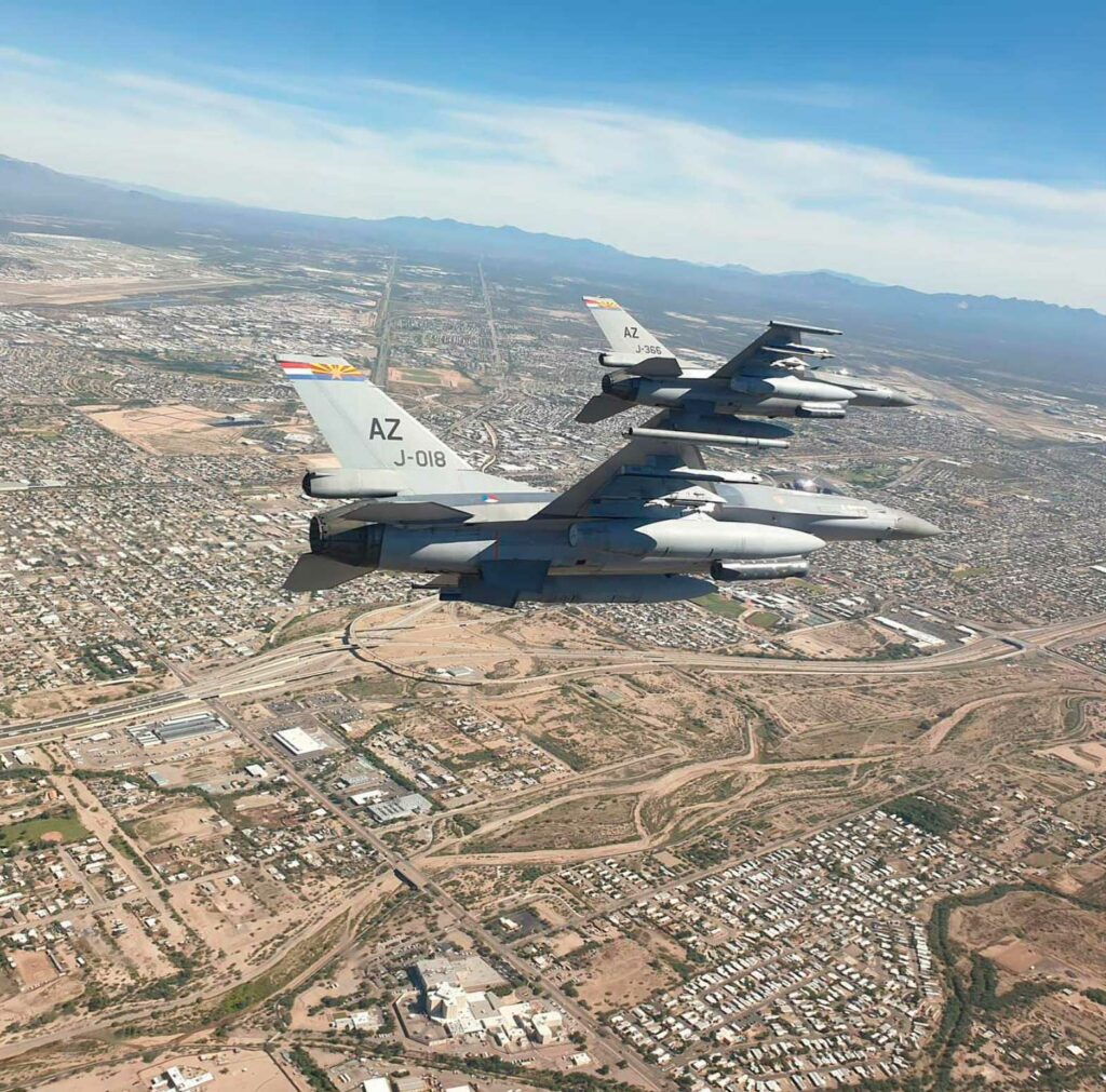 Why is it more difficult to fly a fighter jet during AI-simulated combat than during actual training?